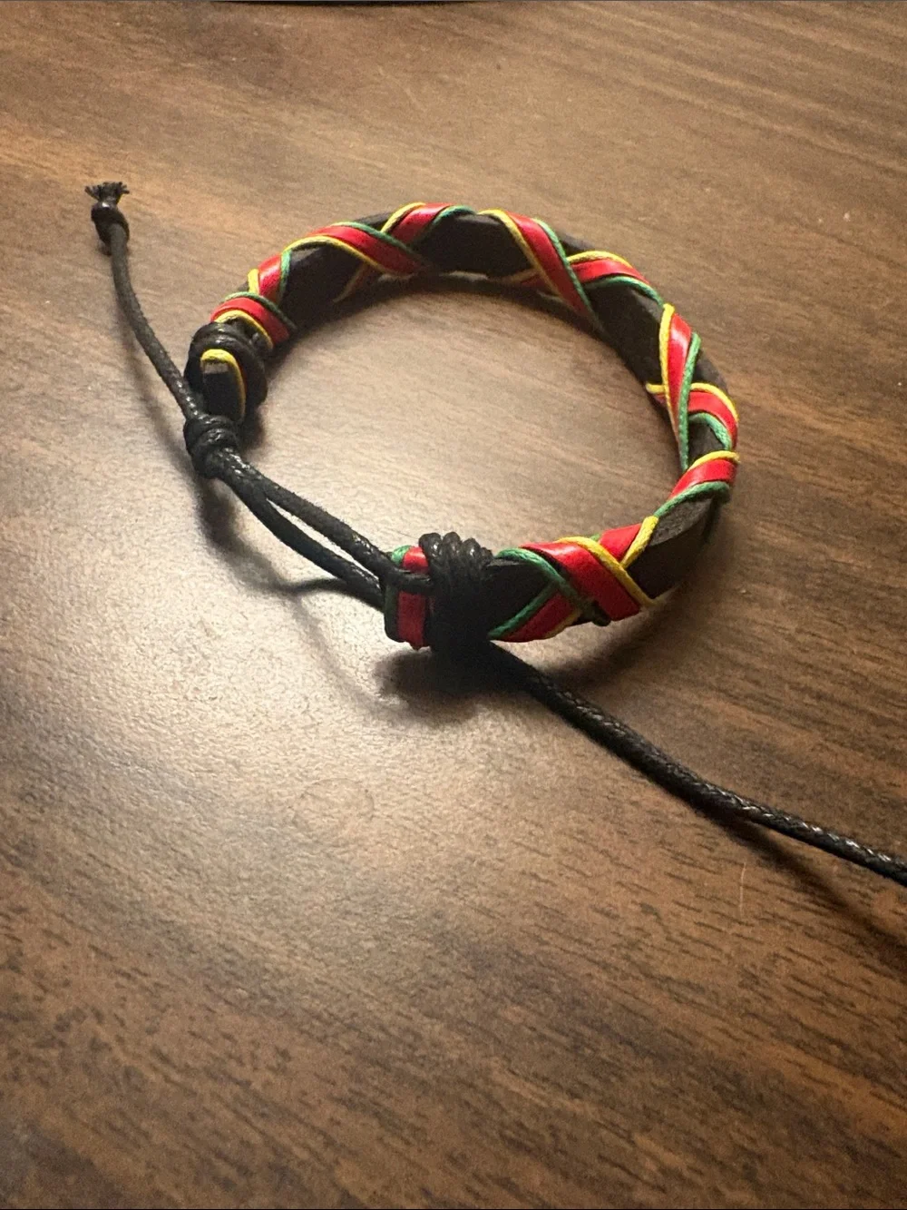 Black Braided Leather Bracelet with Red, Yellow & Green Accents